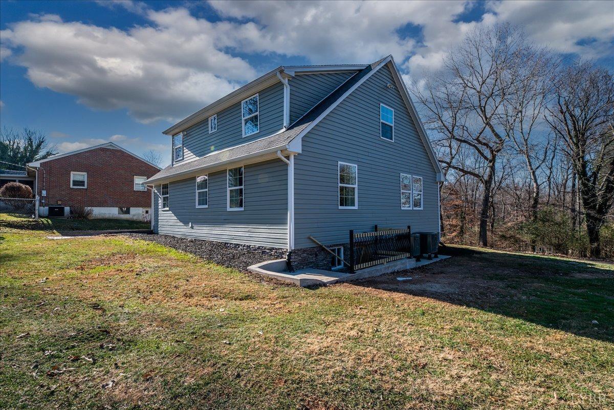 132 Spring Street Madison Heights, VA 24572 - Photo 51 of 63 a front view of a house with a yard