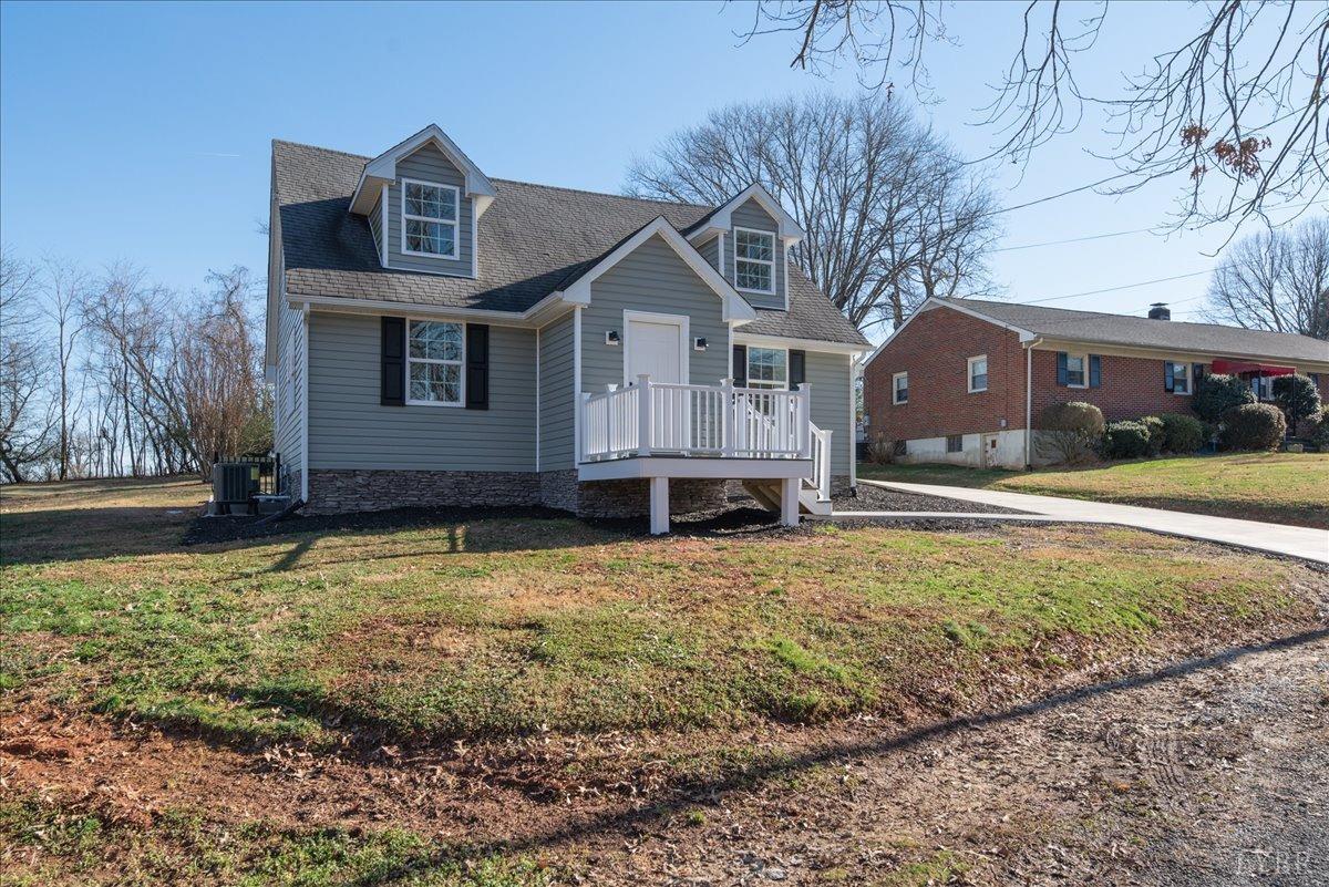 132 Spring Street Madison Heights, VA 24572 - Photo 53 of 63 a front view of a house with a yard