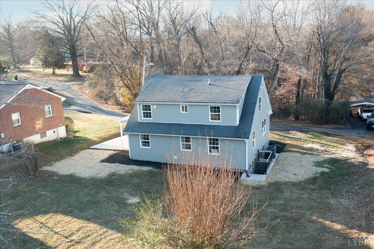 132 Spring Street Madison Heights, VA 24572 - Photo 54 of 63 a view of a house with a yard