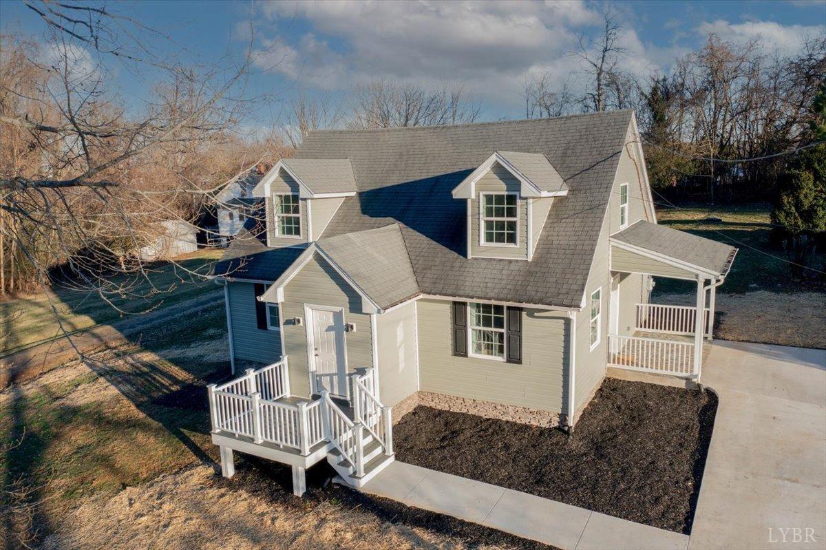 132 Spring Street Madison Heights, VA 24572 - Photo 60 of 63 a front view of a house with a yard