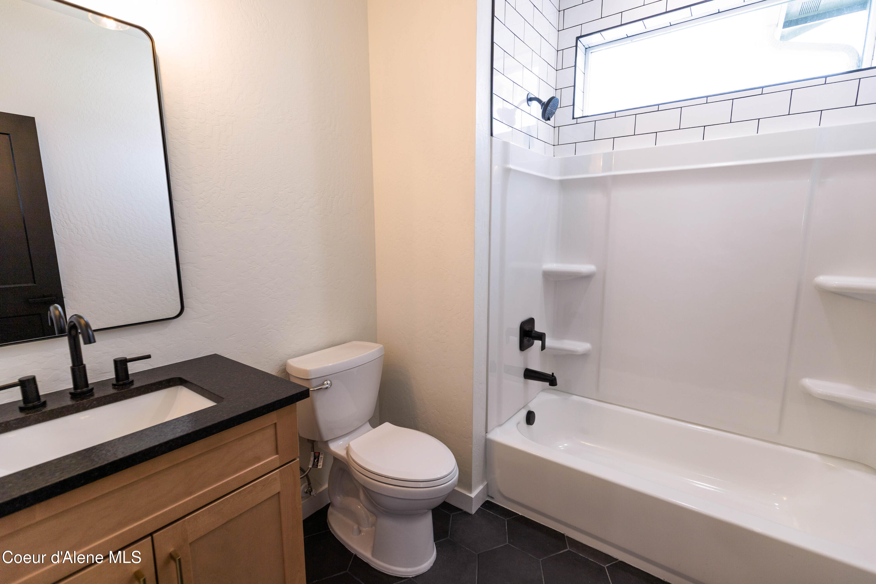 677 West Rory Avenue Post Falls, ID 83854 - Photo 9 of 36 UpstairsGuestBathroom