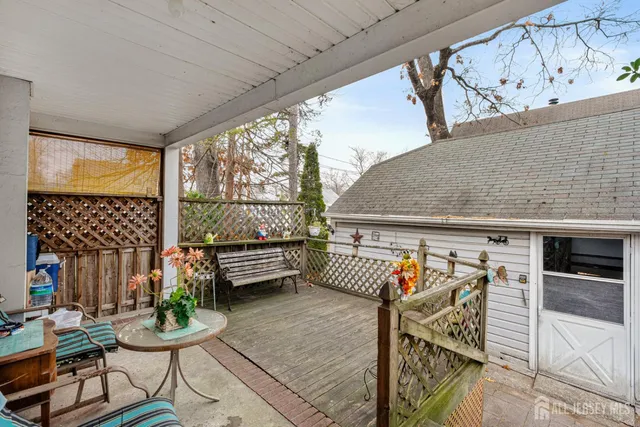 a outdoor space with patio the couches and a dining table with the garden view