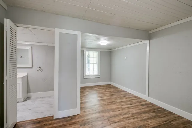 a view of an empty room and window