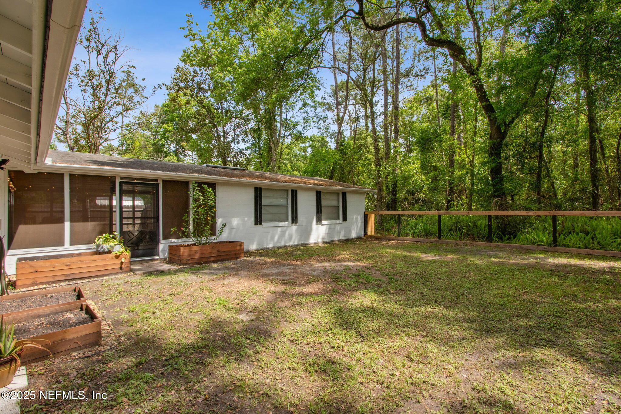 6625 Aline Road Jacksonville, FL 32244 - Photo 13 of 13 Backyard with raised gardens