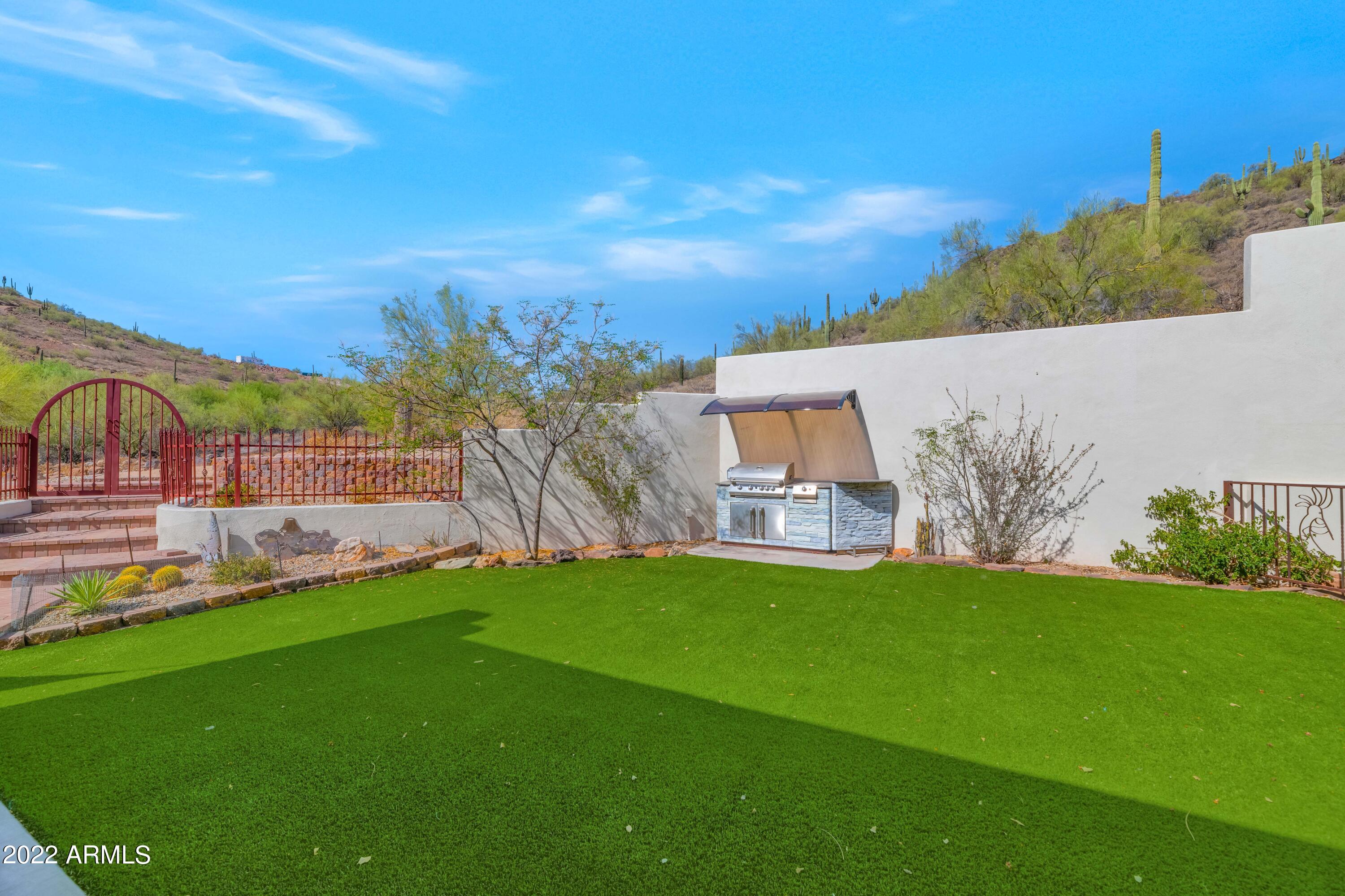 3103 West Joy Ranch Road Phoenix, AZ 85086 - Photo 18 of 52 Manicured back yard.