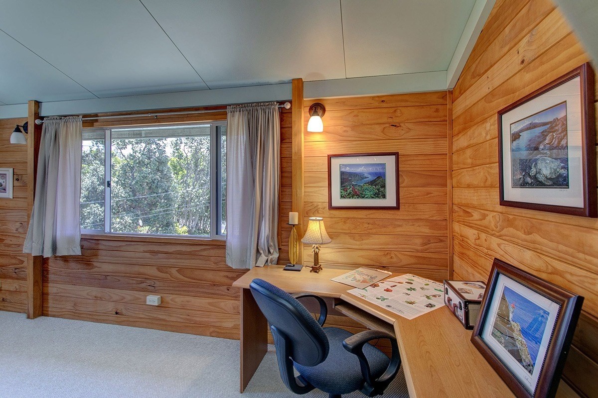 99-7721 Kilau Place Volcano, HI 96785 - Photo 13 of 26 a room with furniture and window