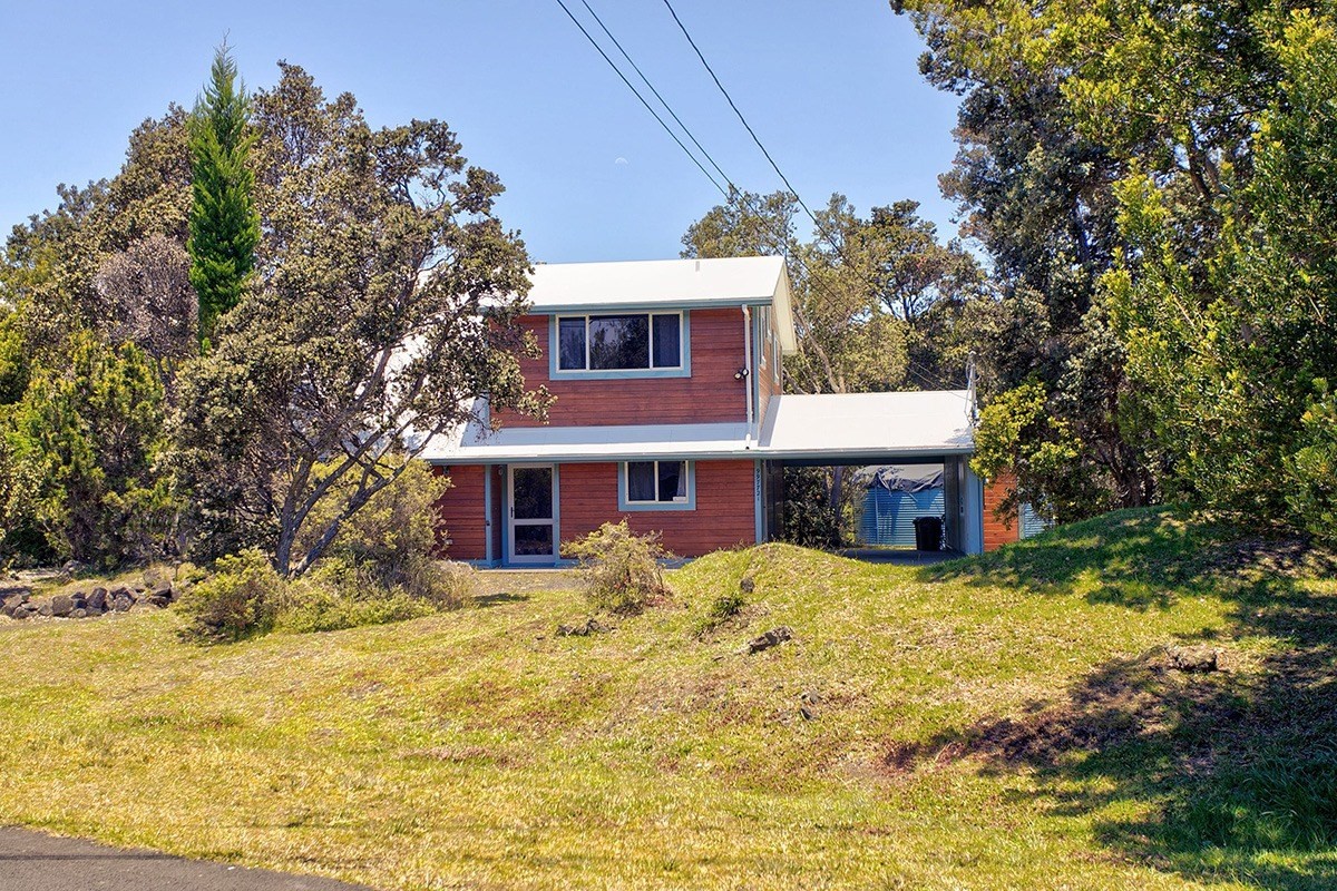99-7721 Kilau Place Volcano, HI 96785 - Photo 22 of 26 a view of a house with snow on the tree