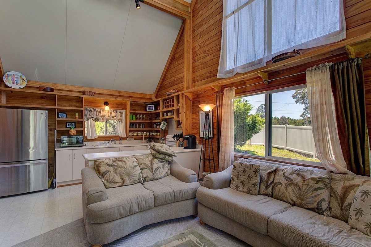 99-7721 Kilau Place Volcano, HI 96785 - Photo 10 of 26 a living room with furniture and a window
