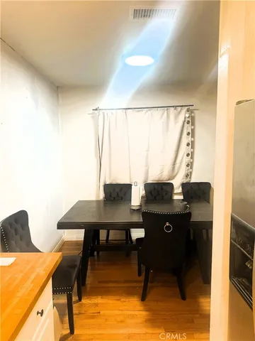 a view of a workspace with furniture