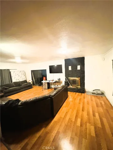 a view of a swimming pool with furniture