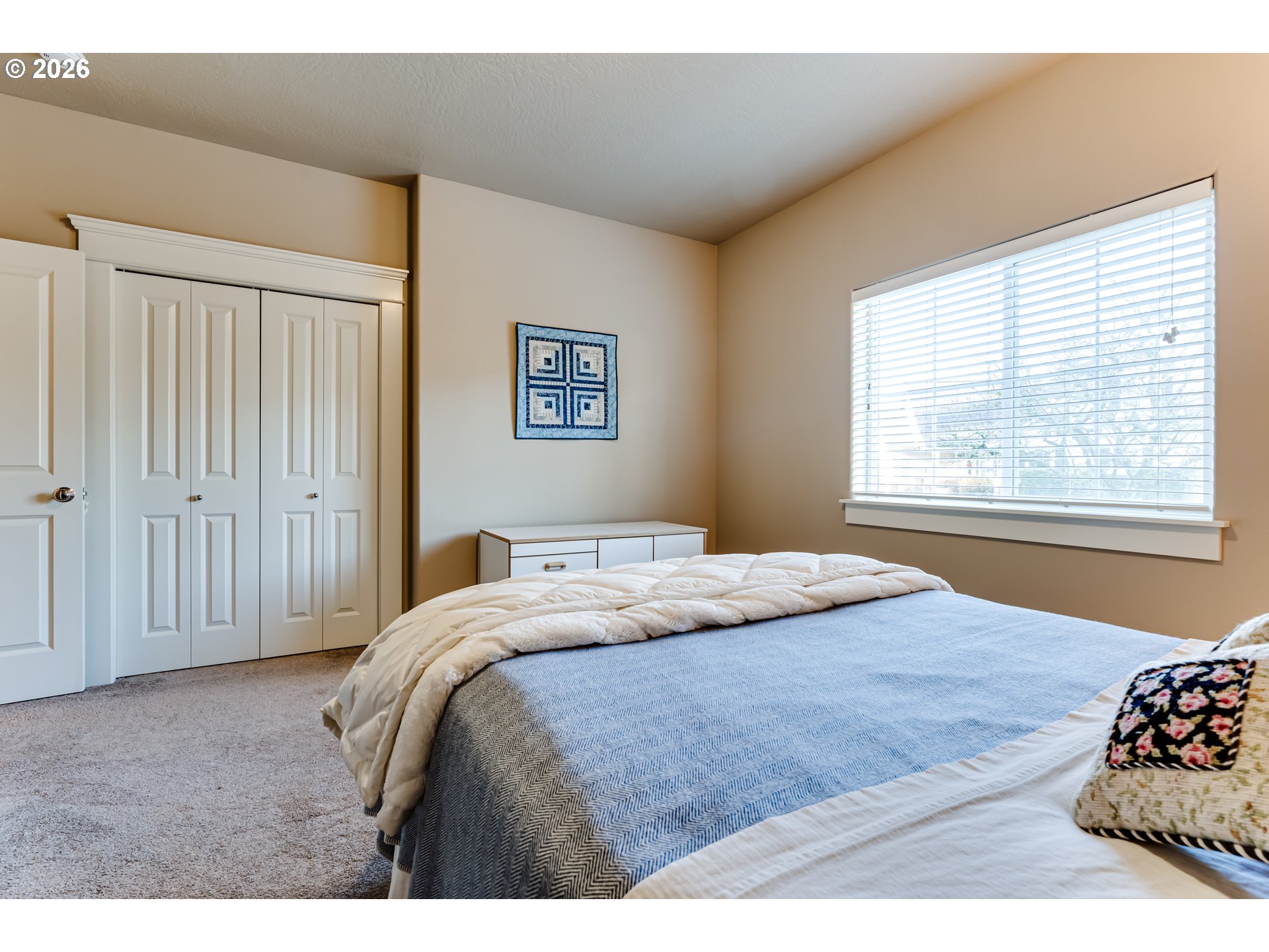 90 Daniel Drive Eugene, OR 97404 - Photo 31 of 48 a bedroom with a bed and a window