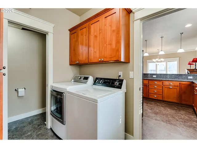 a utility room with washer and dryer