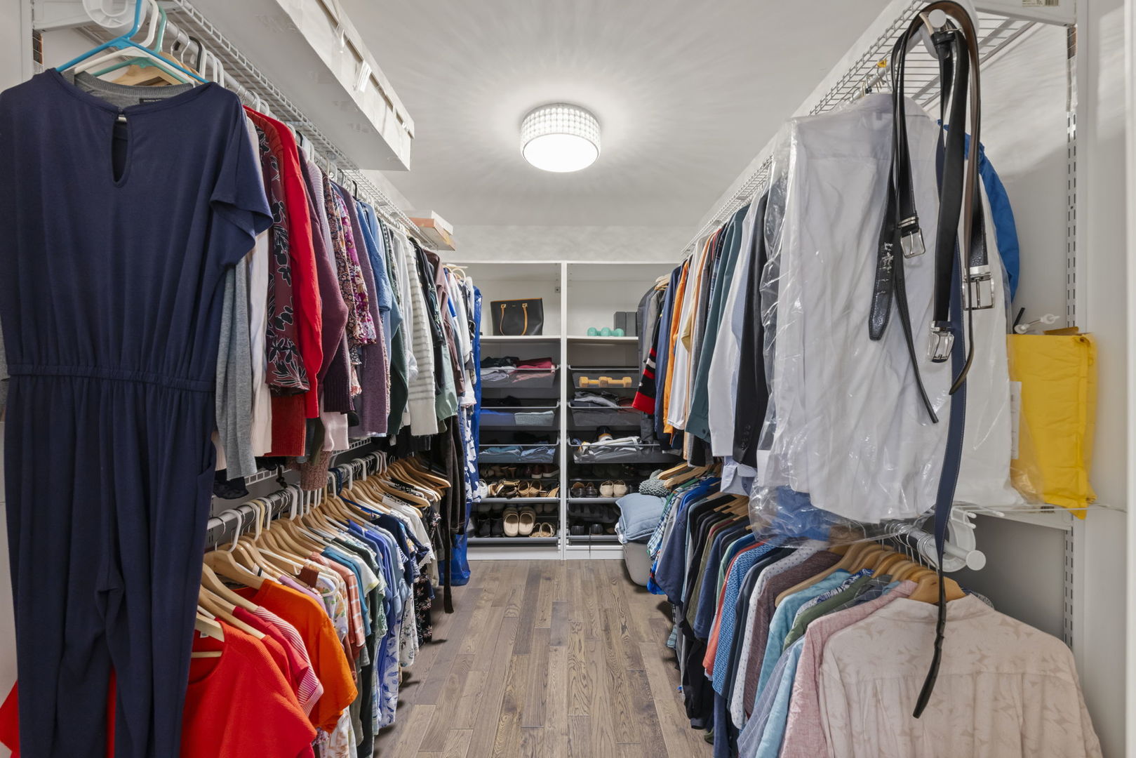 8937 Tara Hill Road Darien, IL 60561 - Photo 12 of 24 a view of walk in closet with clothes