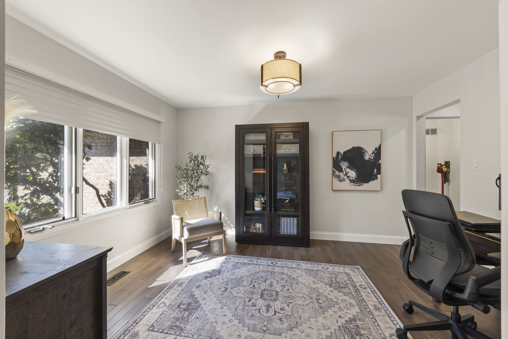 8937 Tara Hill Road Darien, IL 60561 - Photo 17 of 24 a living room with furniture and a window