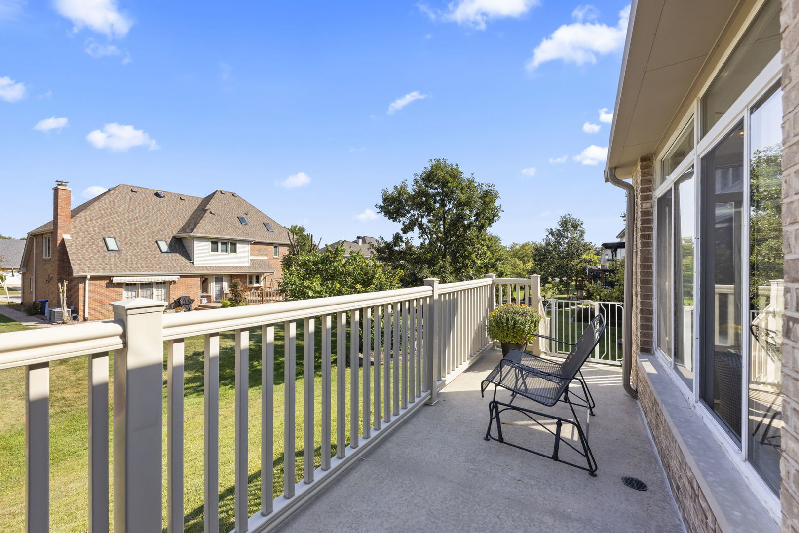 8937 Tara Hill Road Darien, IL 60561 - Photo 22 of 24 a view of a chairs in a balcony