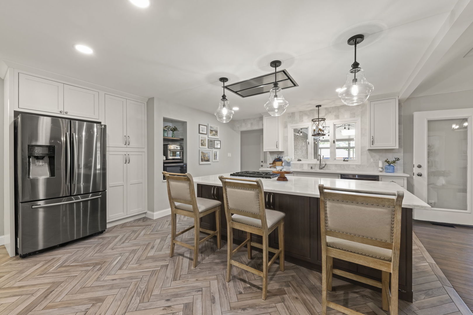 8937 Tara Hill Road Darien, IL 60561 - Photo 3 of 24 a kitchen with stainless steel appliances granite countertop a refrigerator and a stove top oven