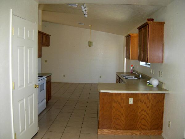 918 Paseo Guebabi Rio Rico, AZ 85648 - Photo 5 of 7 a bathroom with a sink and a mirror