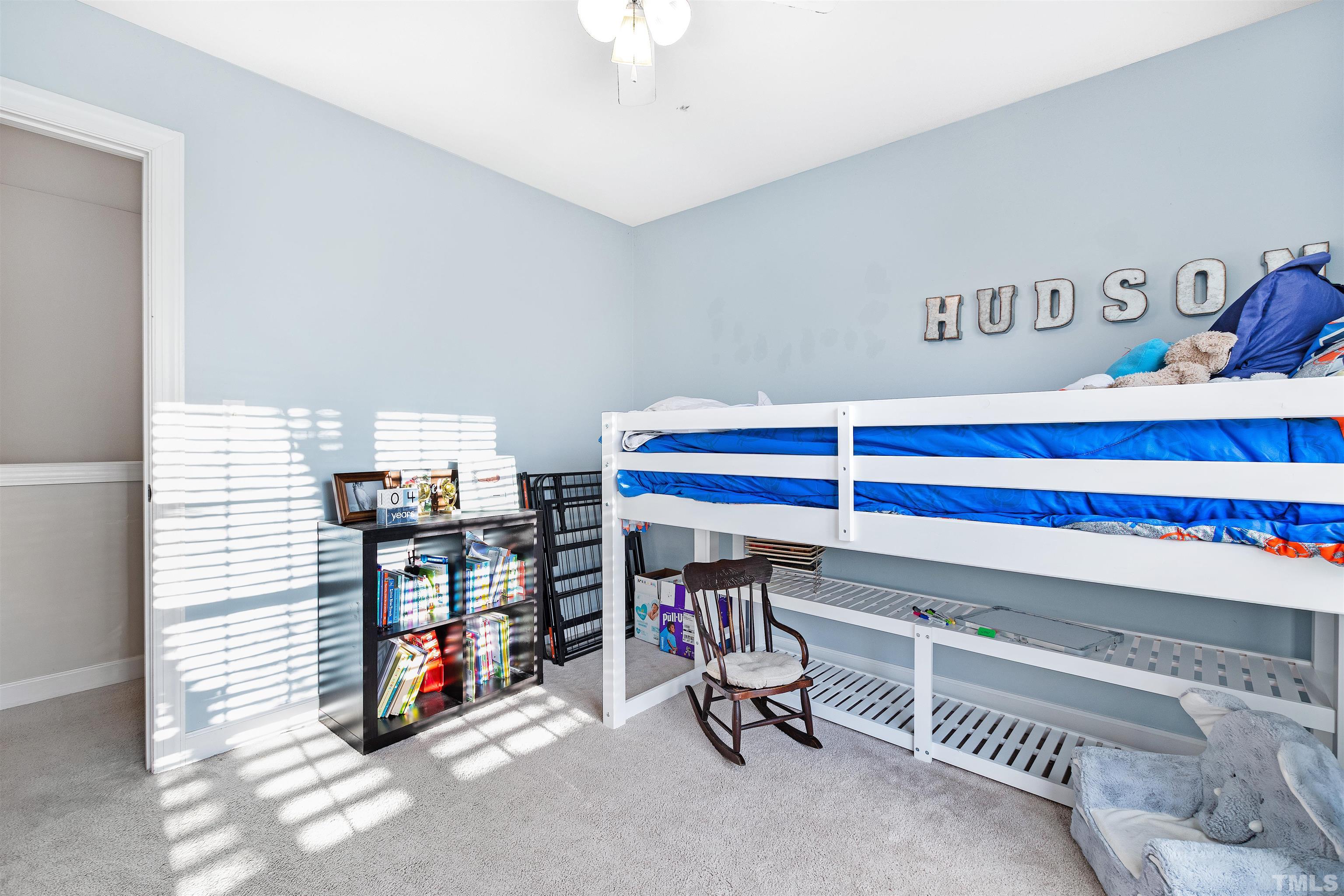 4928 Morning Edge Drive Raleigh, NC 27613 - Photo 16 of 25 a view of a room with gym equipment