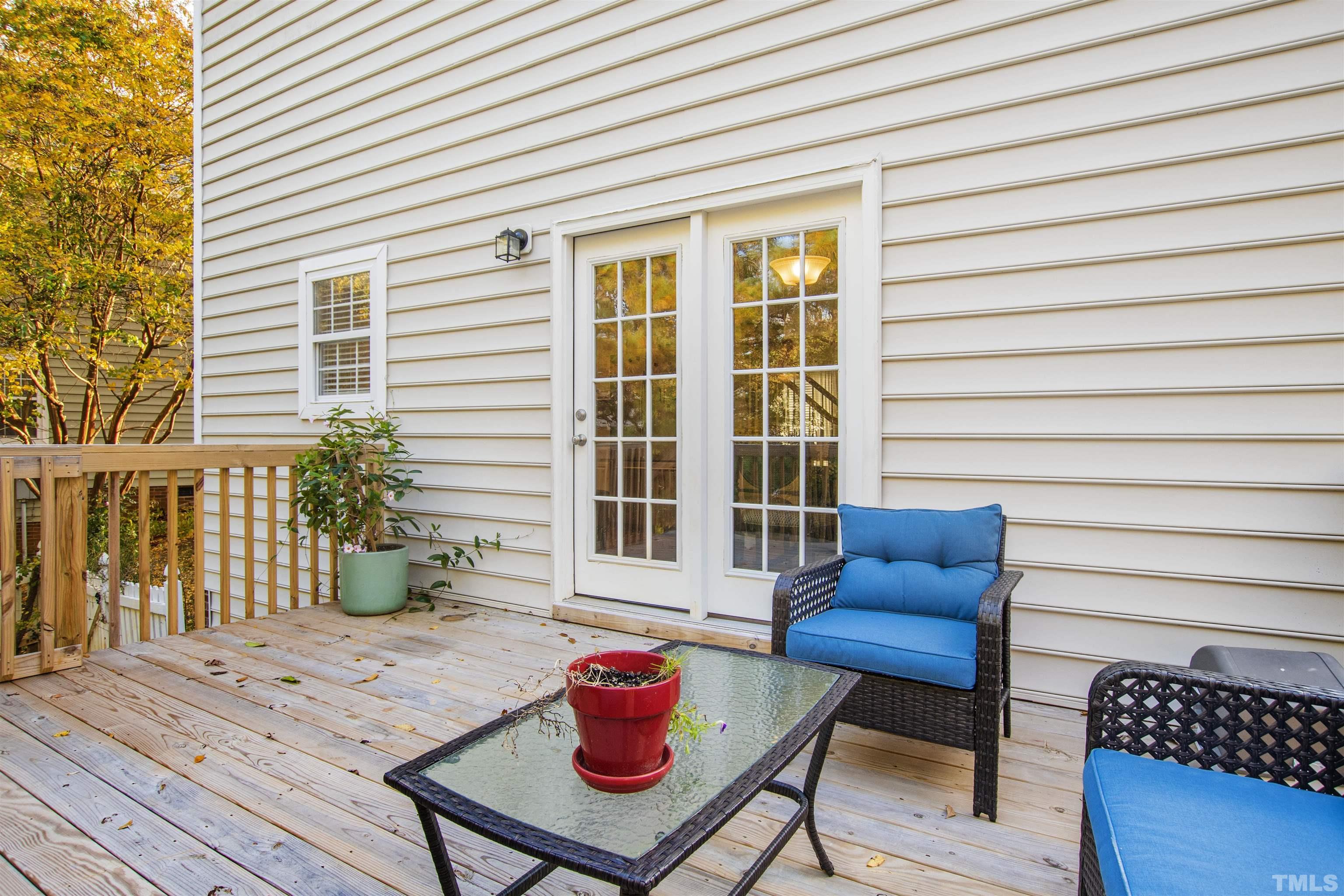 4928 Morning Edge Drive Raleigh, NC 27613 - Photo 24 of 25 a backyard of a house with seating space
