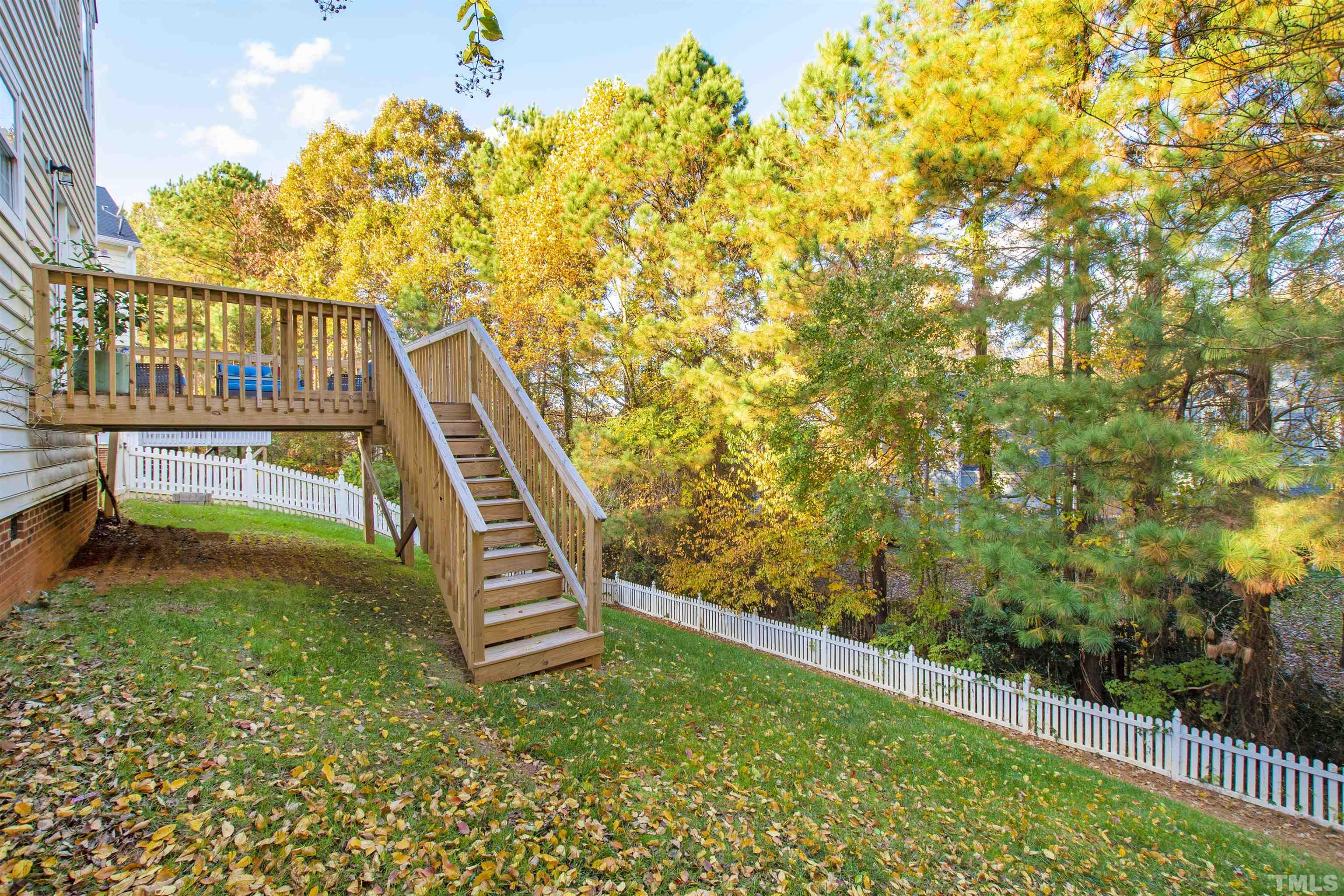 4928 Morning Edge Drive Raleigh, NC 27613 - Photo 25 of 25 a view of an entryway with a small yard