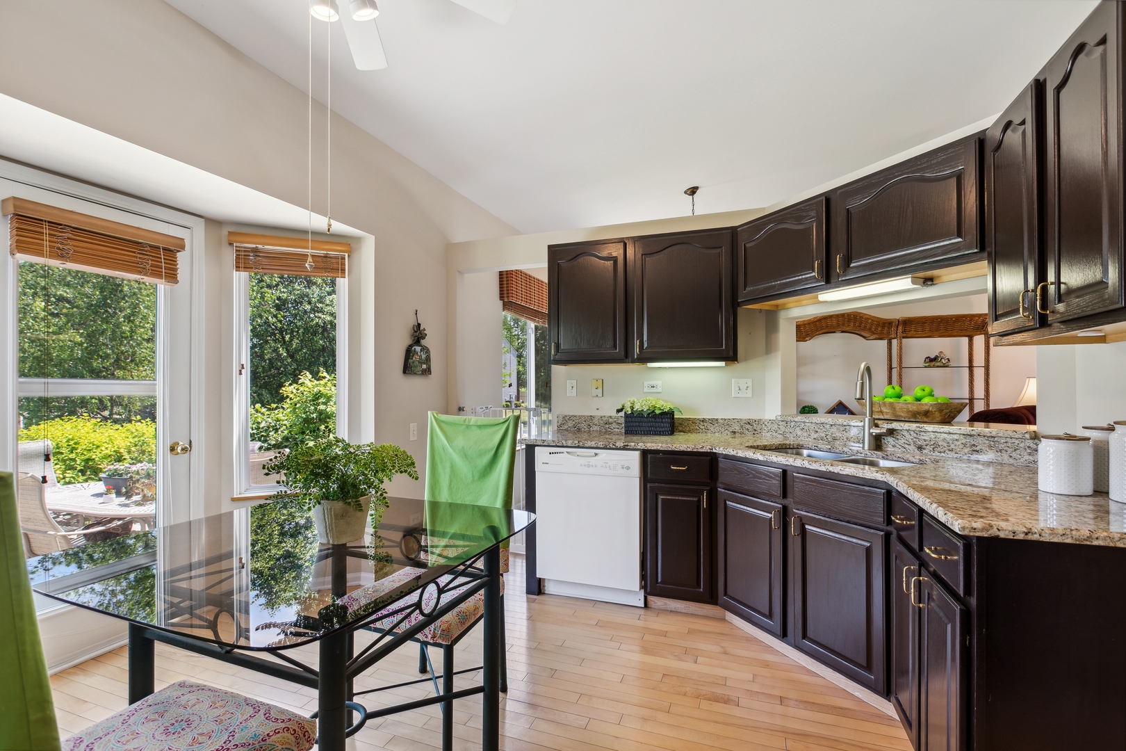 1039 Willow Bay Elgin, IL 60123 - Photo 11 of 30 a kitchen with stainless steel appliances granite countertop sink stove and refrigerator