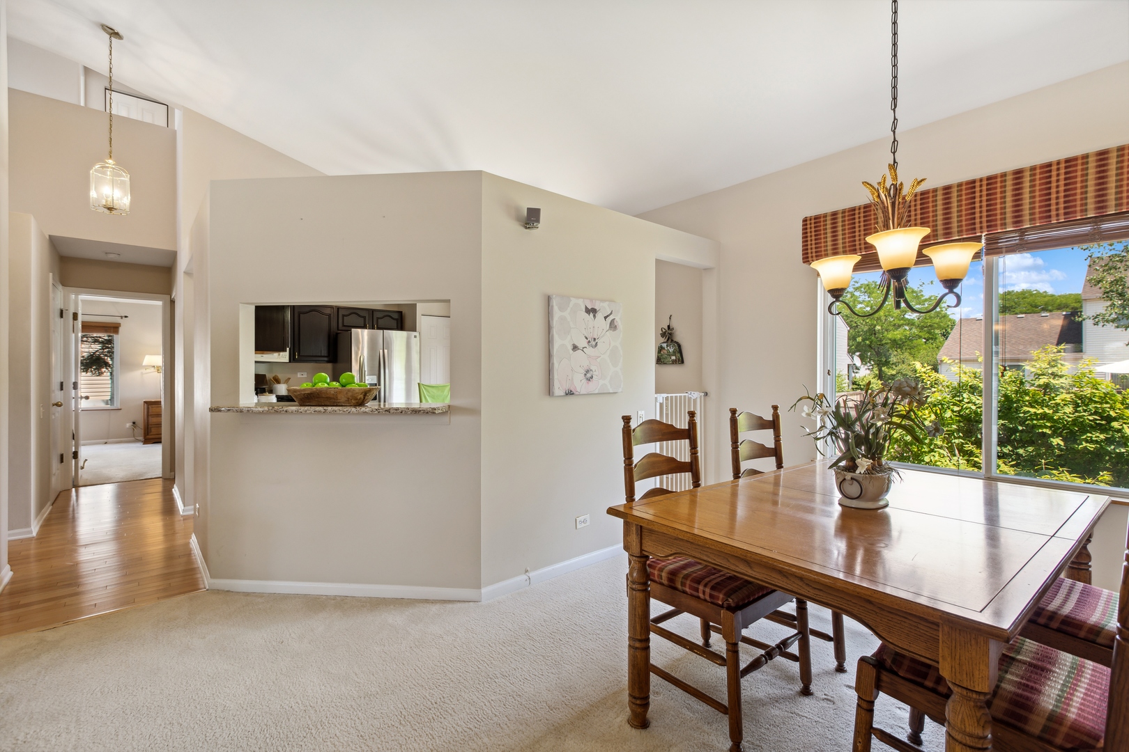 1039 Willow Bay Elgin, IL 60123 - Photo 7 of 30 a view of a dining room with furniture and window