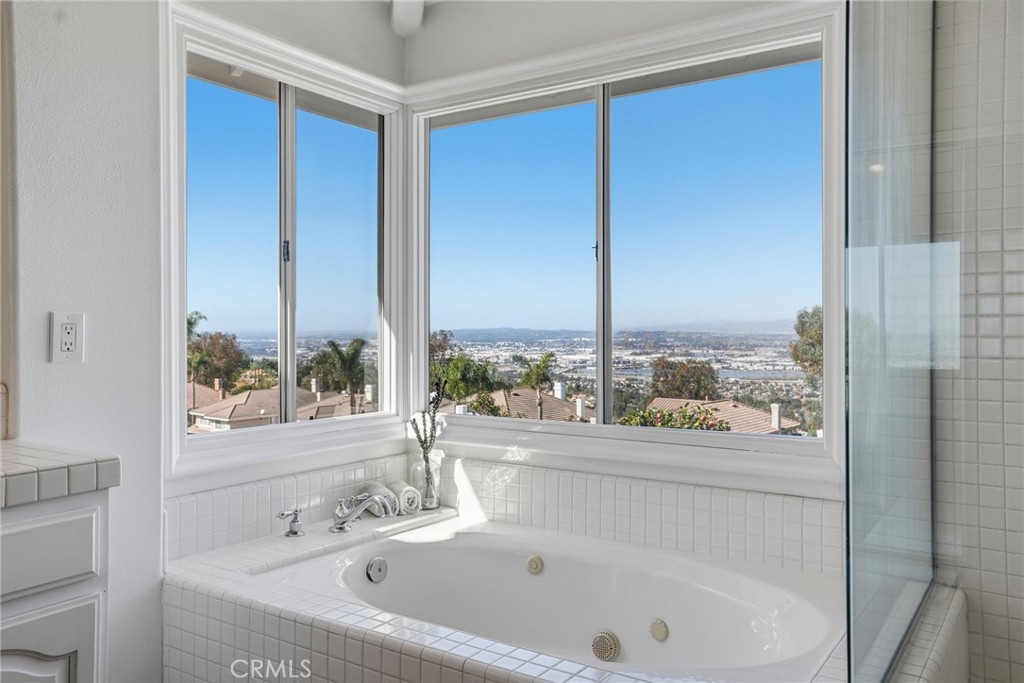 2796 North Meredith Street Orange, CA 92867 - Photo 38 of 55 Main bedroom bathroom with mirrored doors for large walkin closet