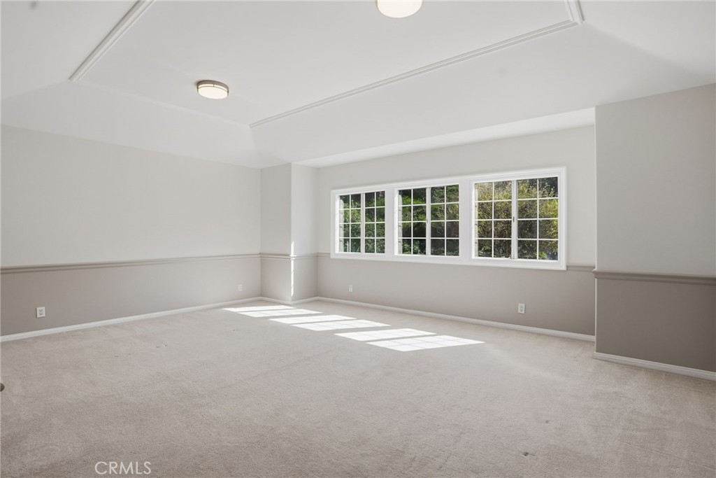 2796 North Meredith Street Orange, CA 92867 - Photo 43 of 55 Oversized bedroom. Could be a theater, flex space. Has a walk in closet.