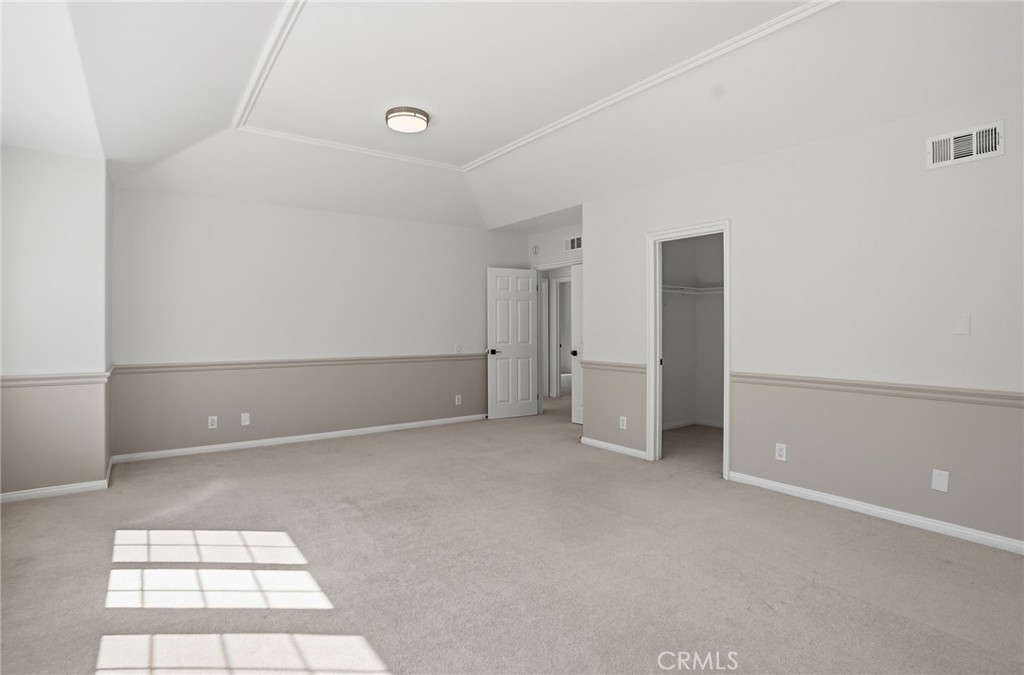 2796 North Meredith Street Orange, CA 92867 - Photo 45 of 55 Oversized bedroom. Could be a theater, flex space. Has a walk in closet.