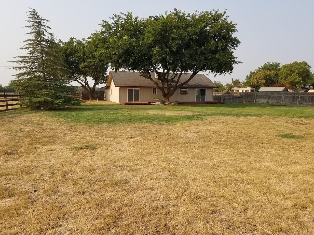 23135 Kindlespire Road Proberta, CA 96078 - Photo 24 of 33 a front view of a house with a yard and trees