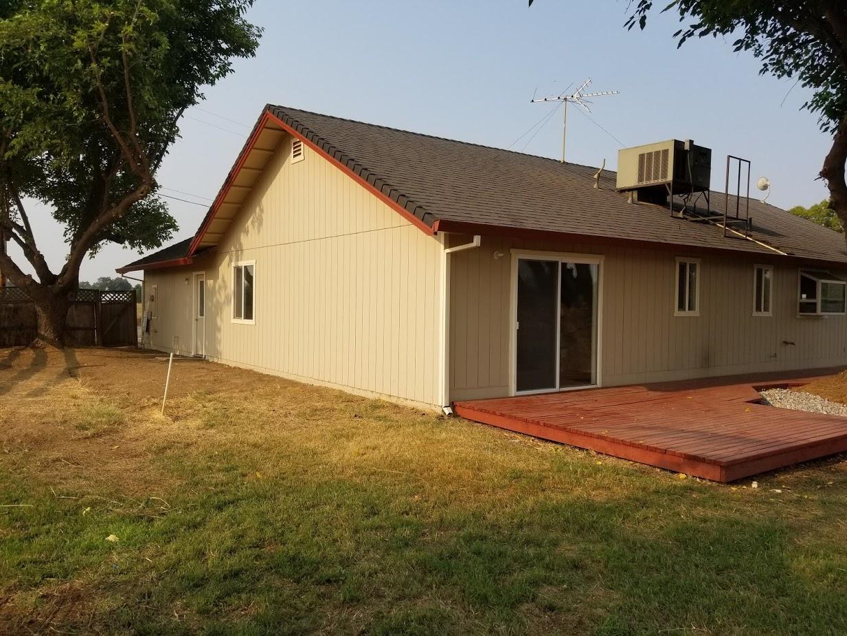 23135 Kindlespire Road Proberta, CA 96078 - Photo 28 of 33 a backyard of a house with table and chairs