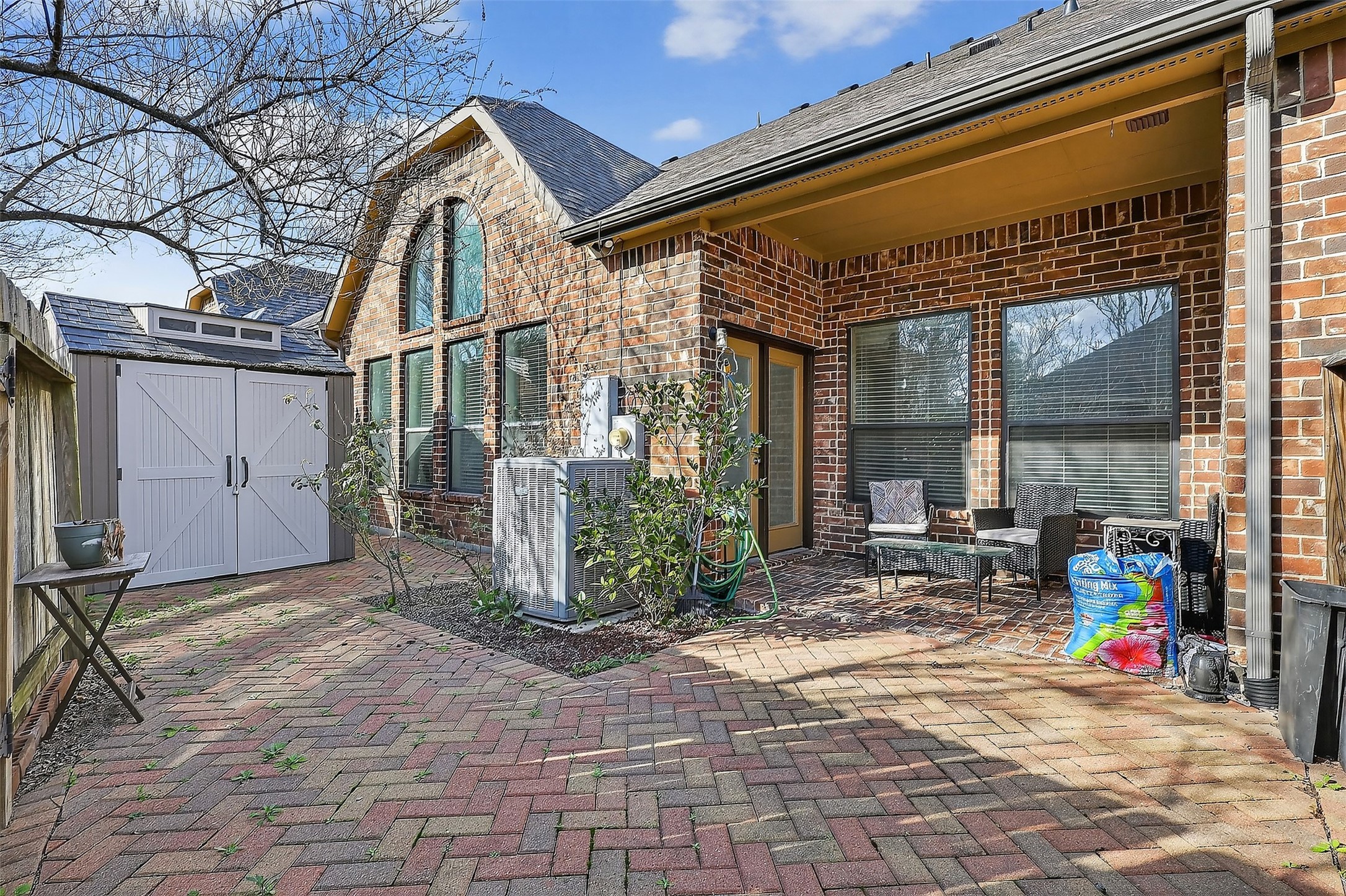 12432 Tyler Springs Lane Humble, TX 77346 - Photo 21 of 25 Back yard with storage shed