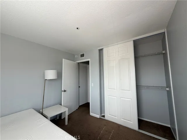 a view of a room with closet area