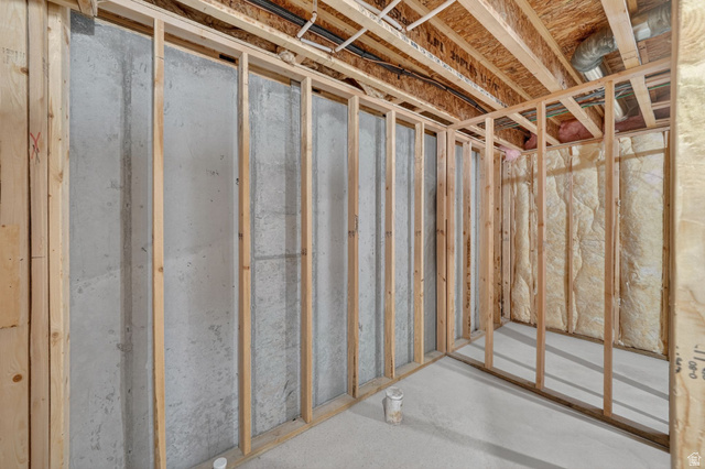 295 Spruce Way Santaquin, UT 84655 - Photo 23 of 32 Unfinished basement space featuring concrete walls, wood framing, and exposed ceiling joists