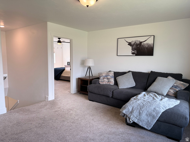 3607 South Parkinson Road South Franklin, ID 83237 - Photo 16 of 24 Carpeted living room with ceiling fan