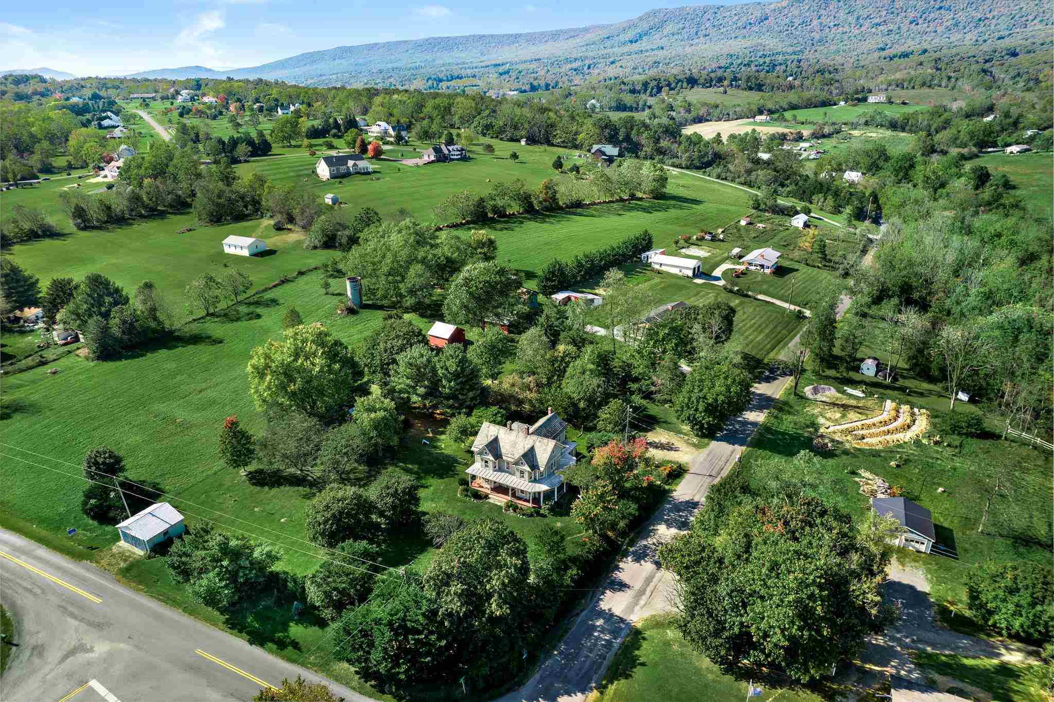 5979 Back Road Woodstock, VA 22664 - Photo 2 of 49 an aerial view of a forest with houses