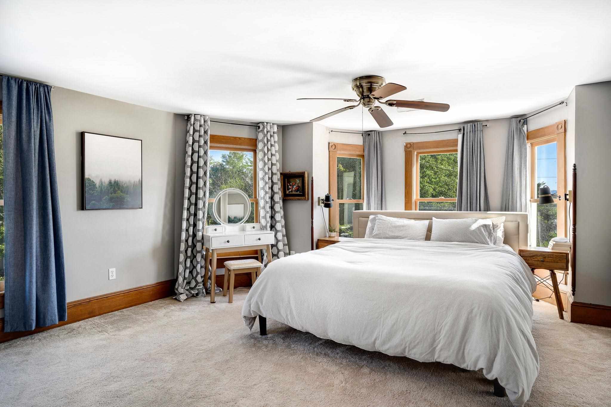 5979 Back Road Woodstock, VA 22664 - Photo 30 of 49 a bedroom with a bed a chandelier and a window