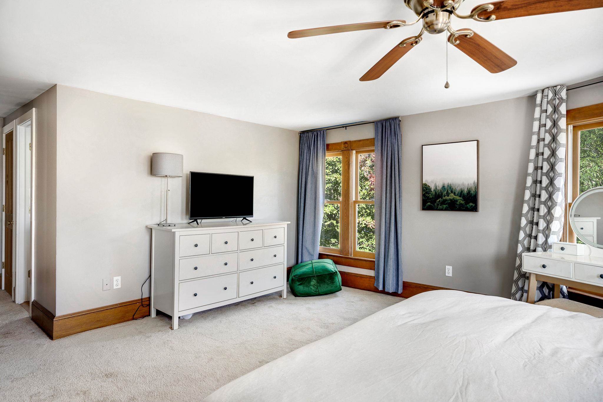 5979 Back Road Woodstock, VA 22664 - Photo 32 of 49 a bedroom with a bed and a flat screen tv