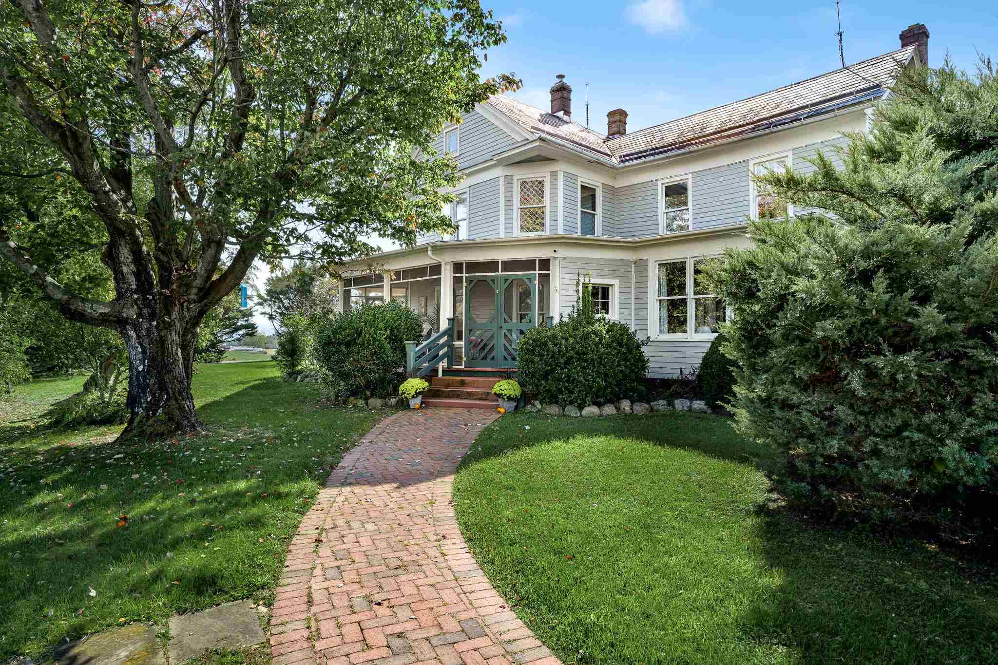 5979 Back Road Woodstock, VA 22664 - Photo 4 of 49 a front view of a house with a yard
