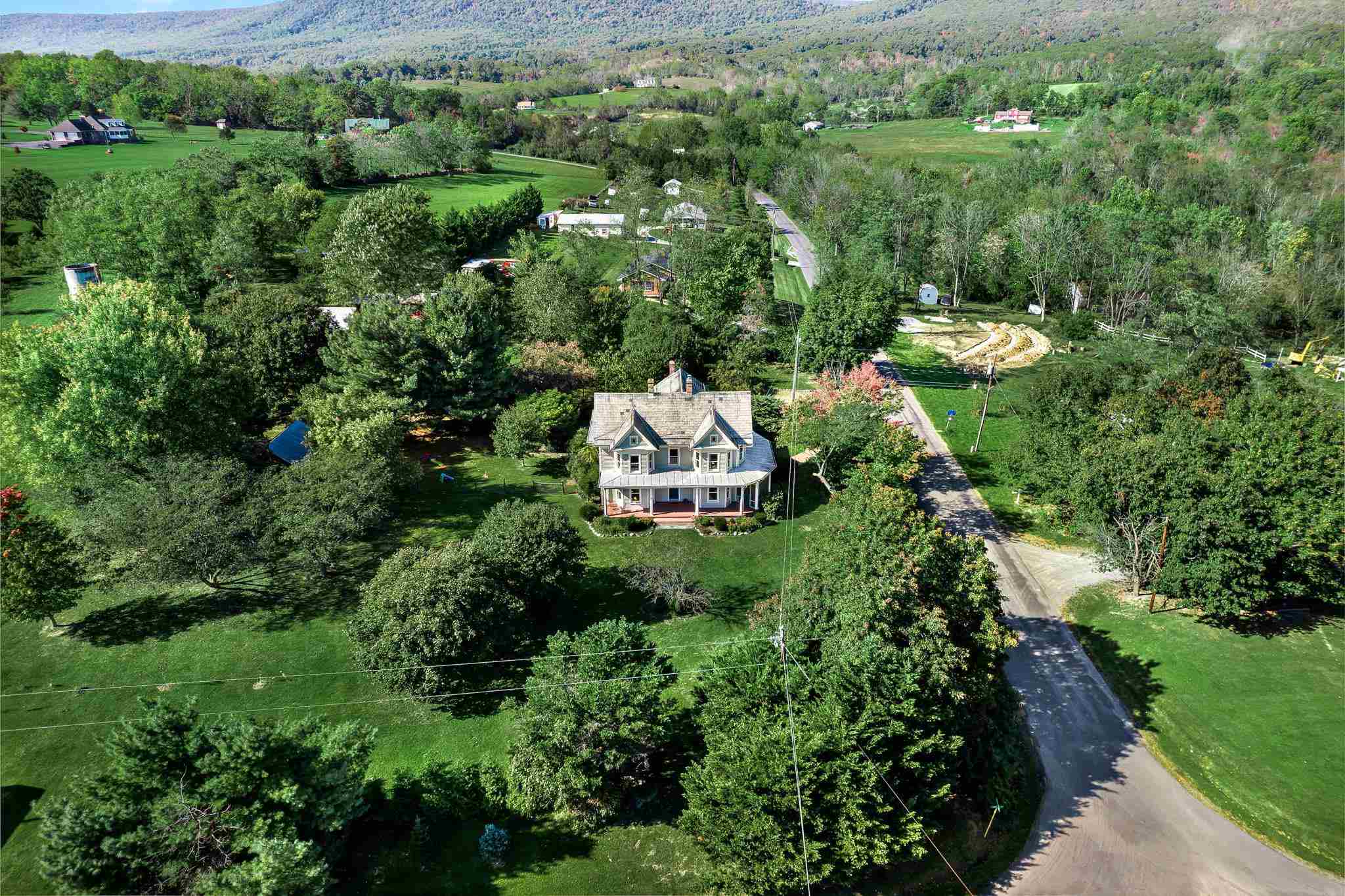 5979 Back Road Woodstock, VA 22664 - Photo 5 of 49 an aerial view of a residential houses with outdoor space and trees all around