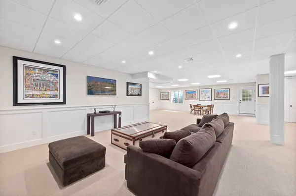 a bedroom with a bed and a ceiling fan