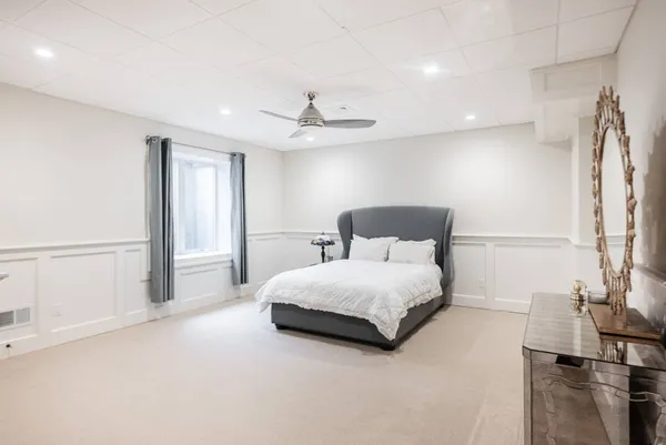 a view of a garden with large tree