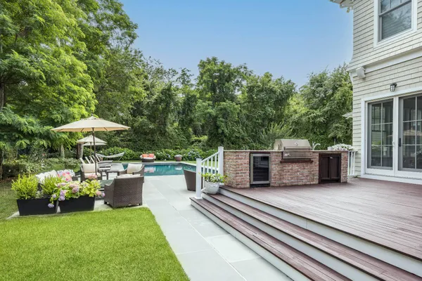 a view of a deck with furniture