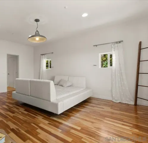 a bathroom with a sink vanity and mirror