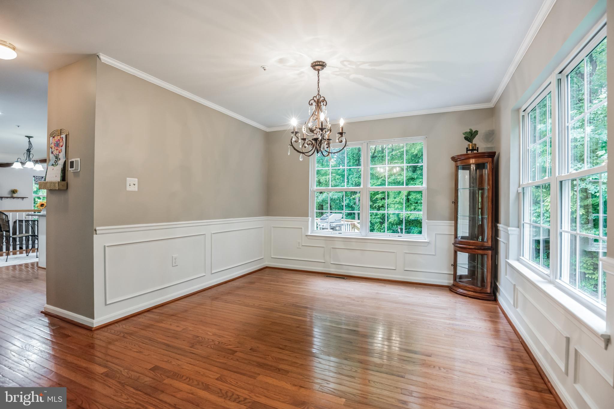 680 Small Reward Road Huntingtown, MD 20639 - Photo 10 of 40 wooden floor in an empty room with a window