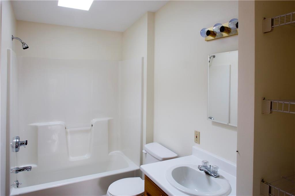 322 Goshen Road Winterport, ME 04496 - Photo 20 of 26 Common second bathroom with skylight