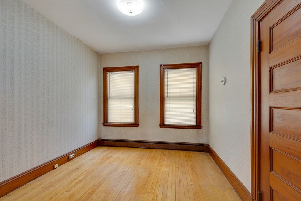 33 Oak Street Boston, MA 02136 - Photo 15 of 18 an empty room with window