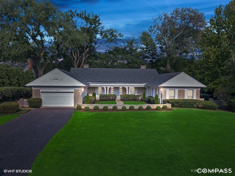 1000 Romona Road Wilmette, IL 60091 - Photo 1 of 4 a front view of a house with garden