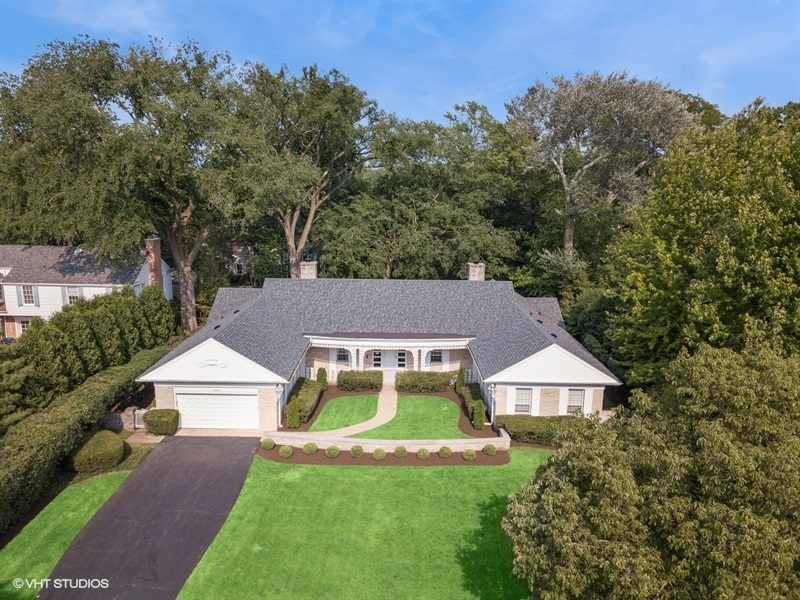 1000 Romona Road Wilmette, IL 60091 - Photo 3 of 4 a aerial view of a house with a yard and potted plants