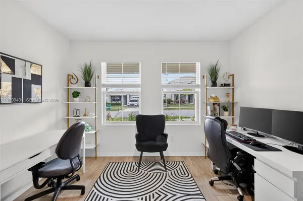 a living room with furniture and a window